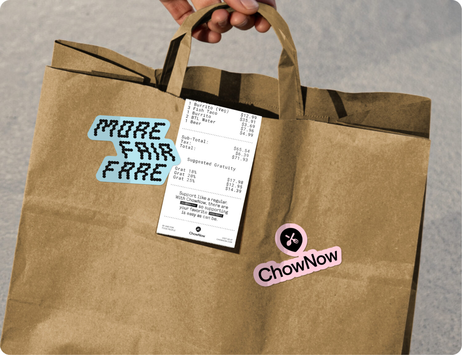 A takeout bag with stickers and a stapled receipt.