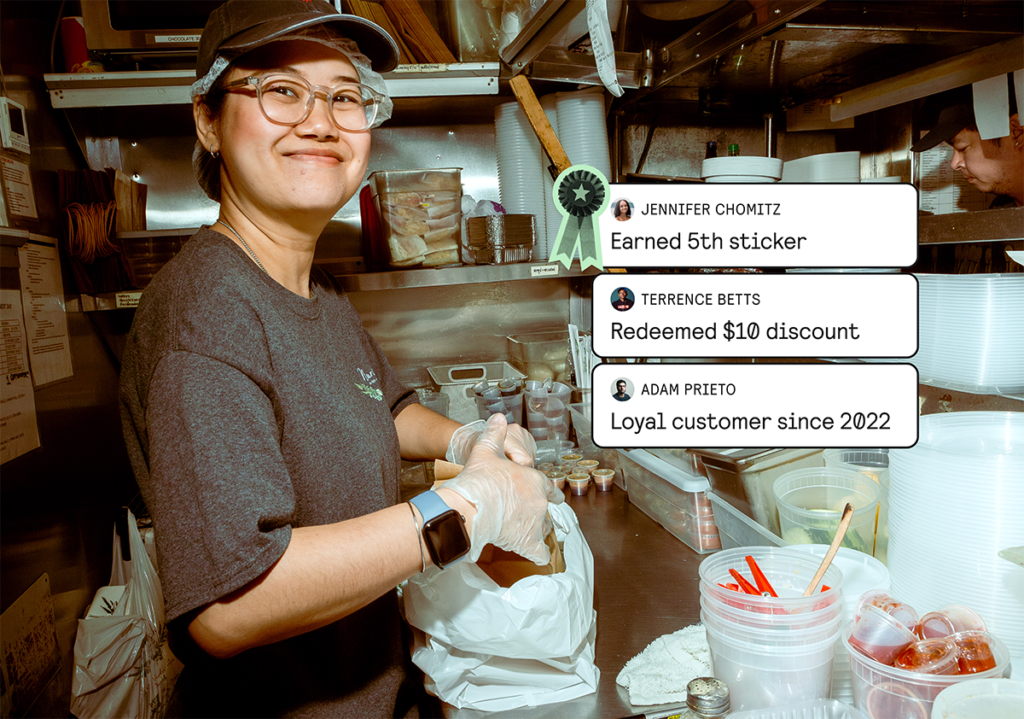 Photo of a smiling restaurant worker holding a takeout bag with text overlays showing promo code “EATLOCAL” and $12 discount.
