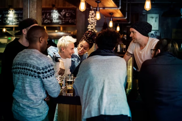 people gathered around table at a bar