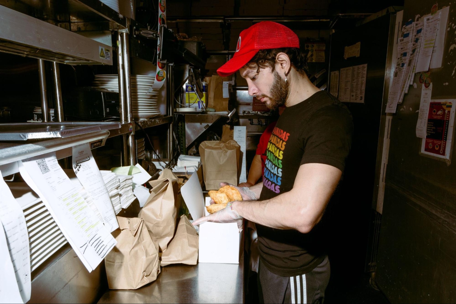 restaurant staff packing takeout orders
