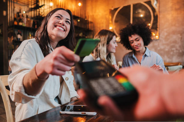customer paying at restaurant