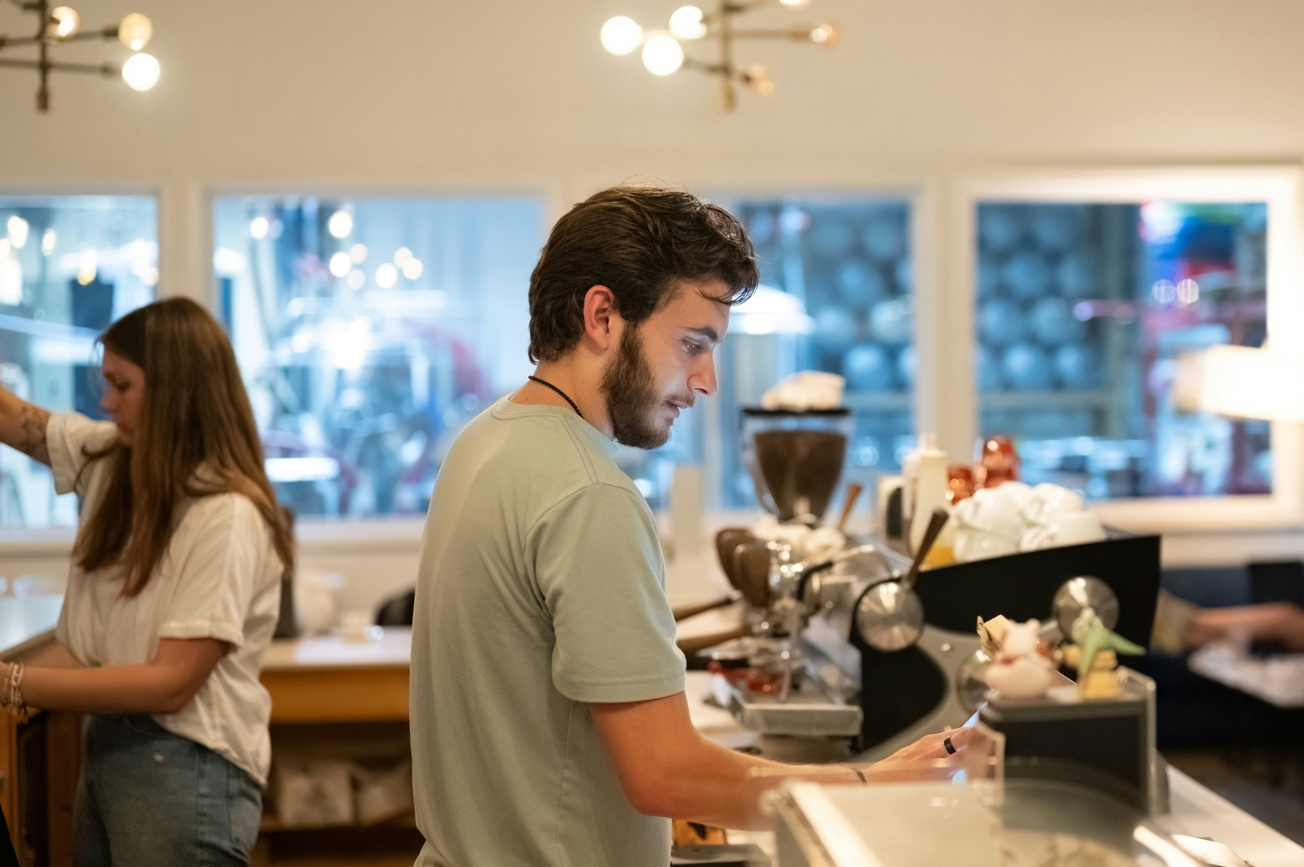 photo of restaurant staff working till