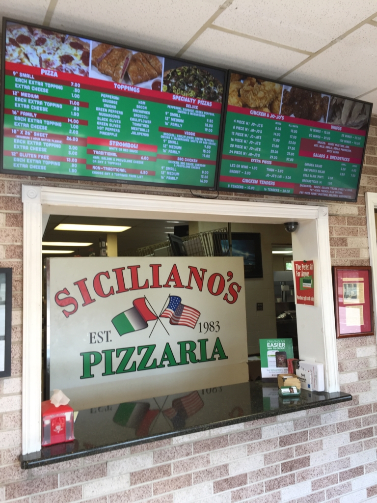Siciliano’s Pizzaria menu board
