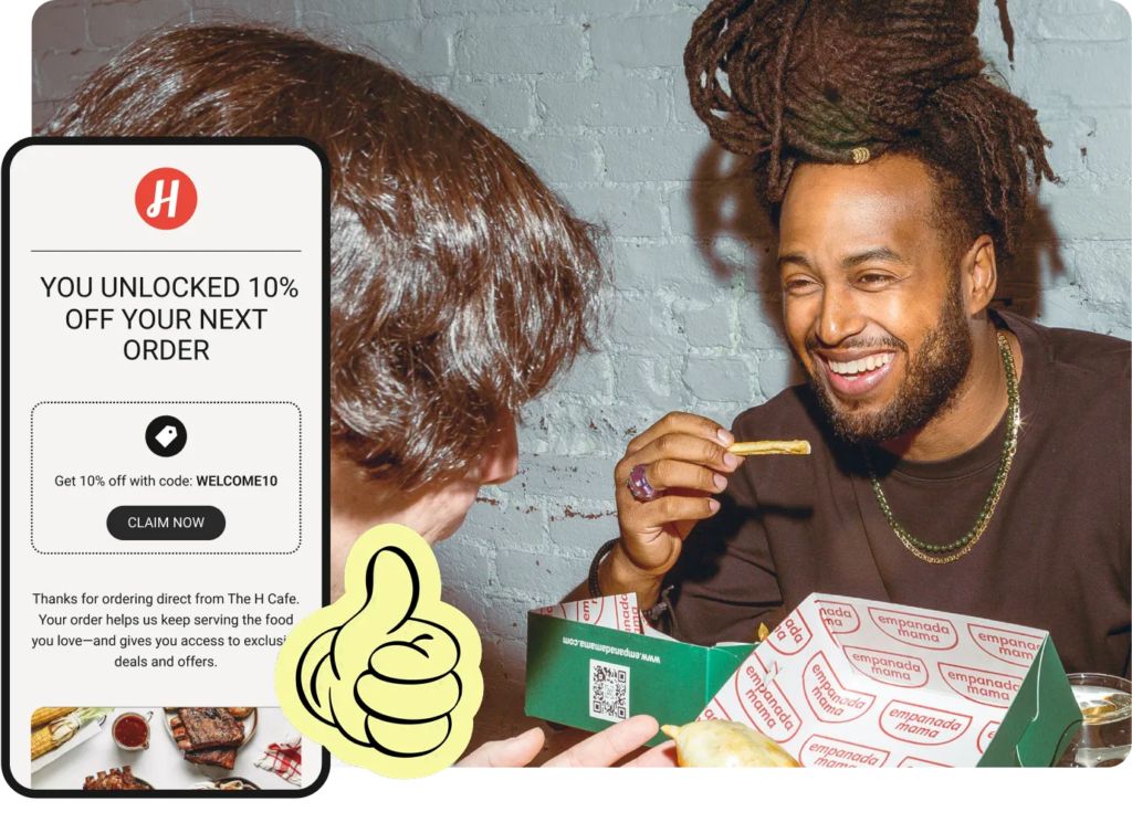 Restaurant guests dining with a loyalty reward offer shown on a phone screen, illustrating direct ordering rewards and repeat customer marketing