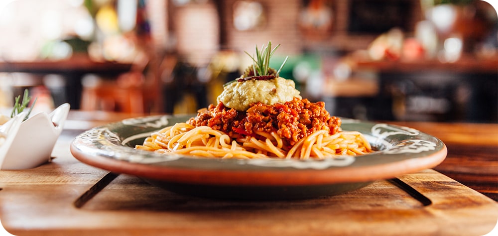 A menu photo of pasta showcases good lighting.