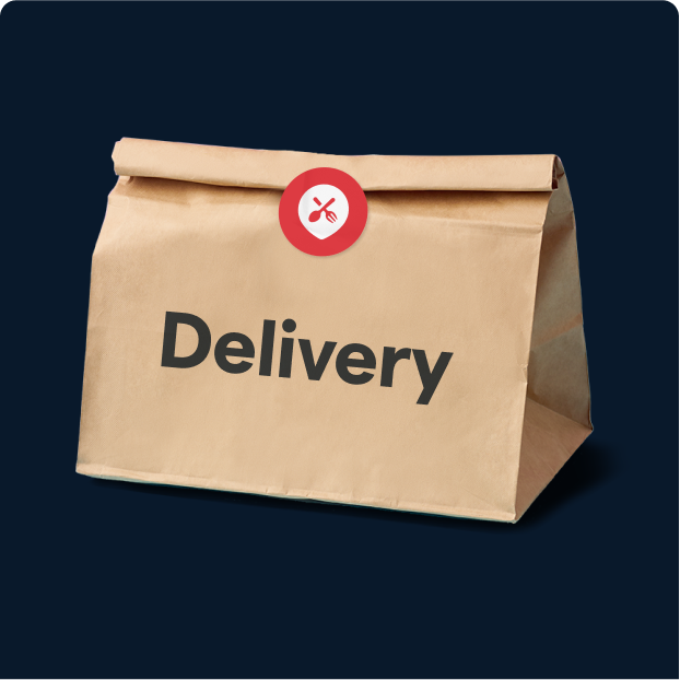 Image of paper bag with the word Delivery and ChowNow sticker