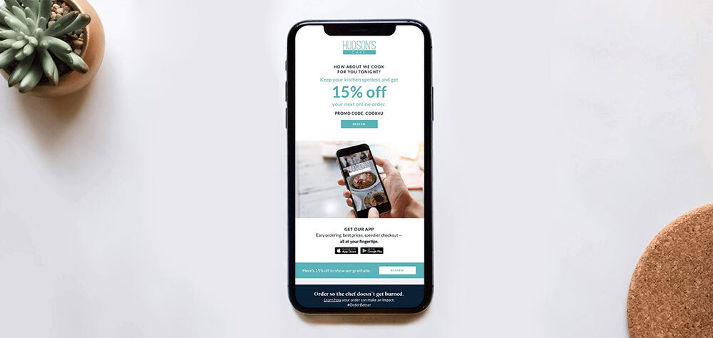 a phone screen displaying a promotion with a discount code